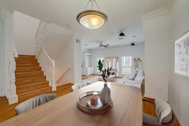 a living room with furniture and a lamp