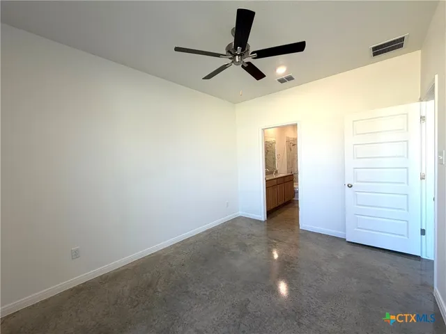 a view of a livingroom with a ceiling fan