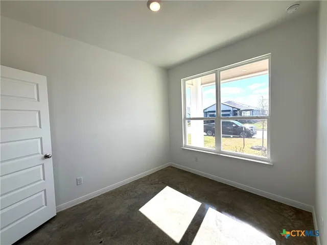 an empty room with a window