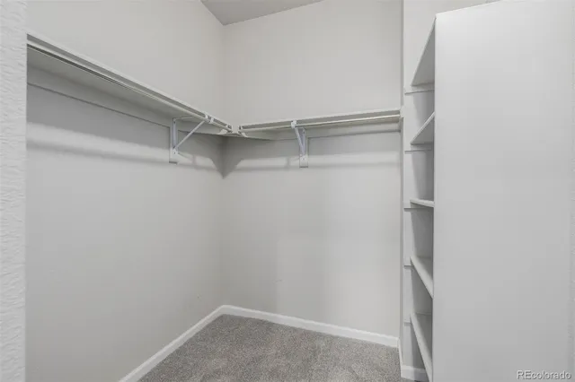 a view of an empty walk in closet