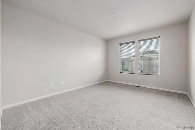 a bathroom with a sink toilet and a mirror