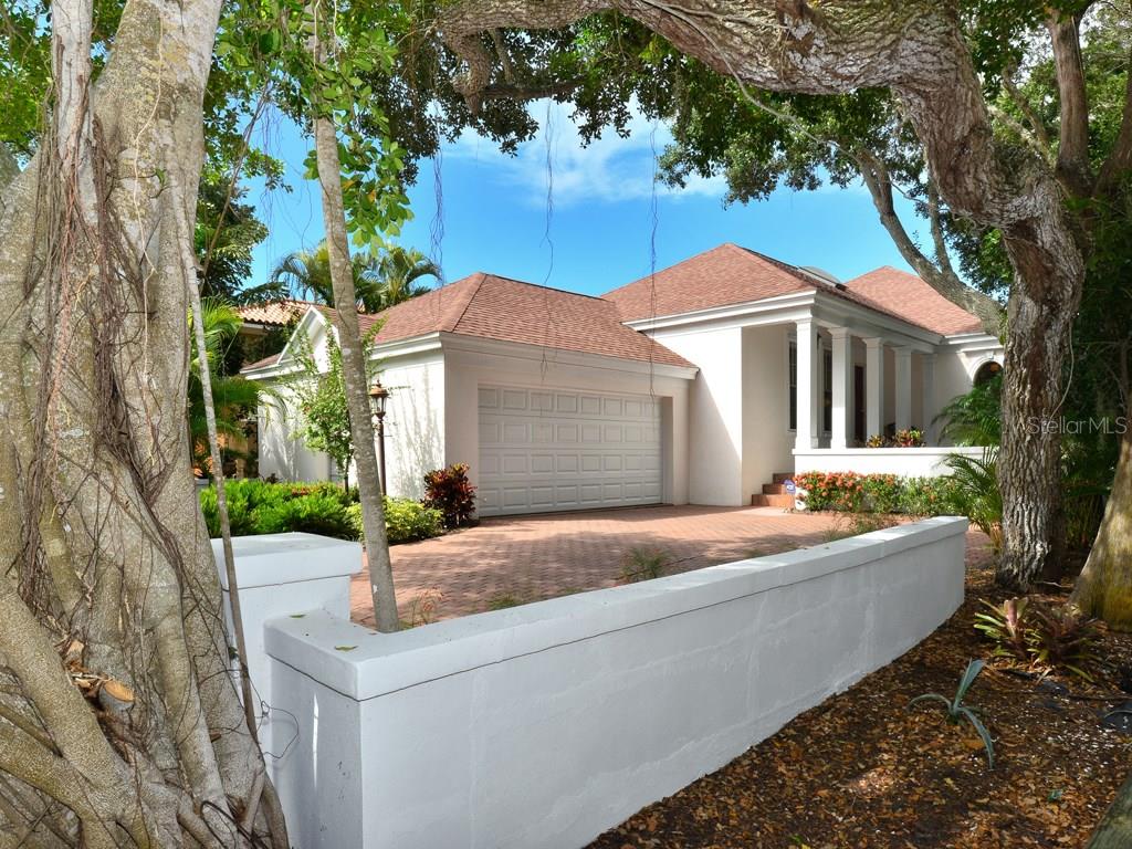 8066 Midnight Pass Road Sarasota, FL 34242 - Photo 1 of 1 a house view with a outdoor space