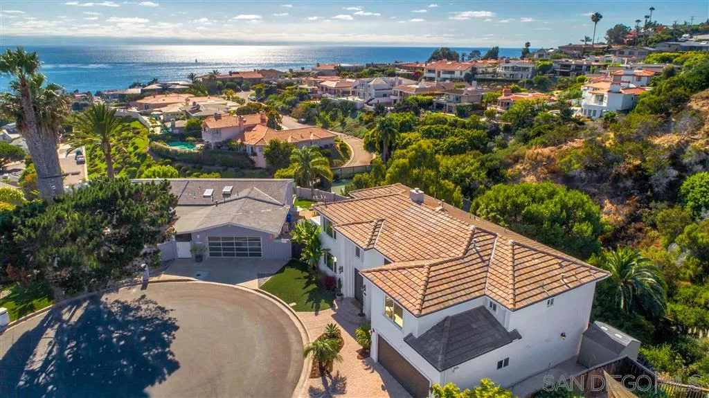 918 Sandpiper Place La Jolla, CA 92037 - Photo 2 of 25 an aerial view of a house with a yard and lake view