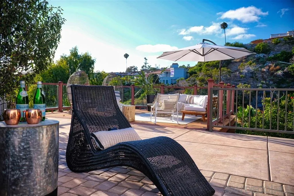 918 Sandpiper Place La Jolla, CA 92037 - Photo 21 of 25 an outdoor sitting area with furniture and a garden