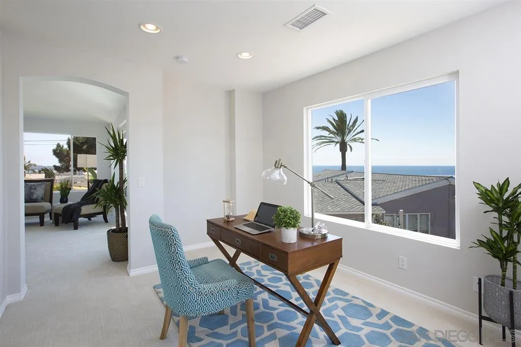918 Sandpiper Place La Jolla, CA 92037 - Photo 25 of 25 a living room with furniture and a potted plant