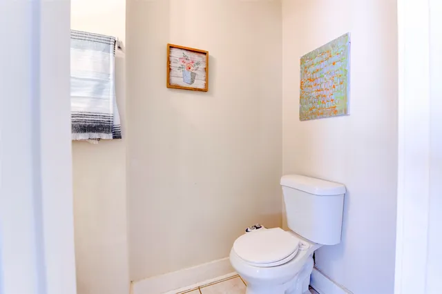 a view of backyard with seating area