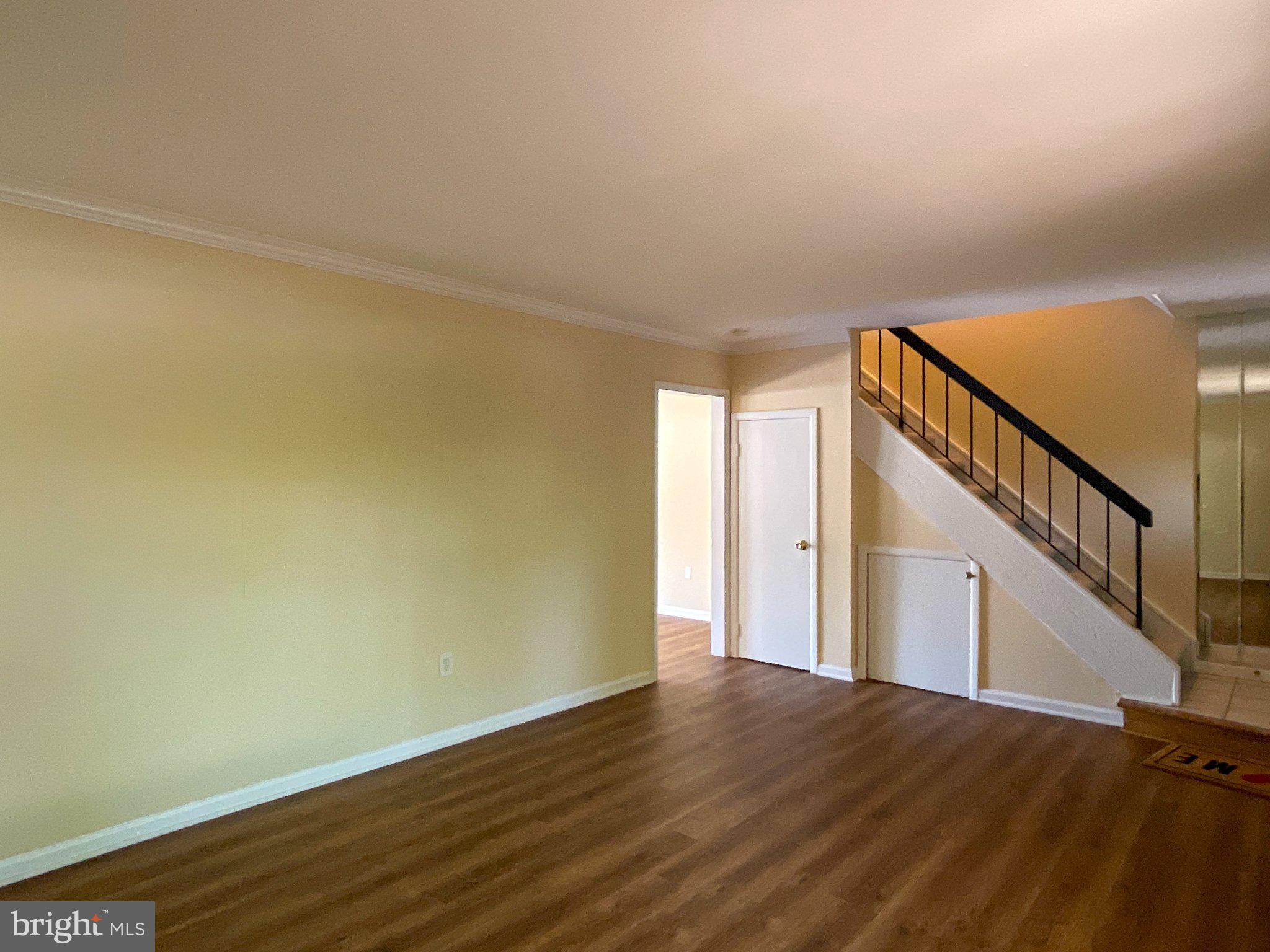 9040 Centerway Road Gaithersburg, MD 20879 - Photo 10 of 45 Spacious living area with warm tones.