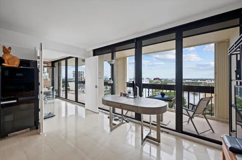 a room with lots of table and chairs