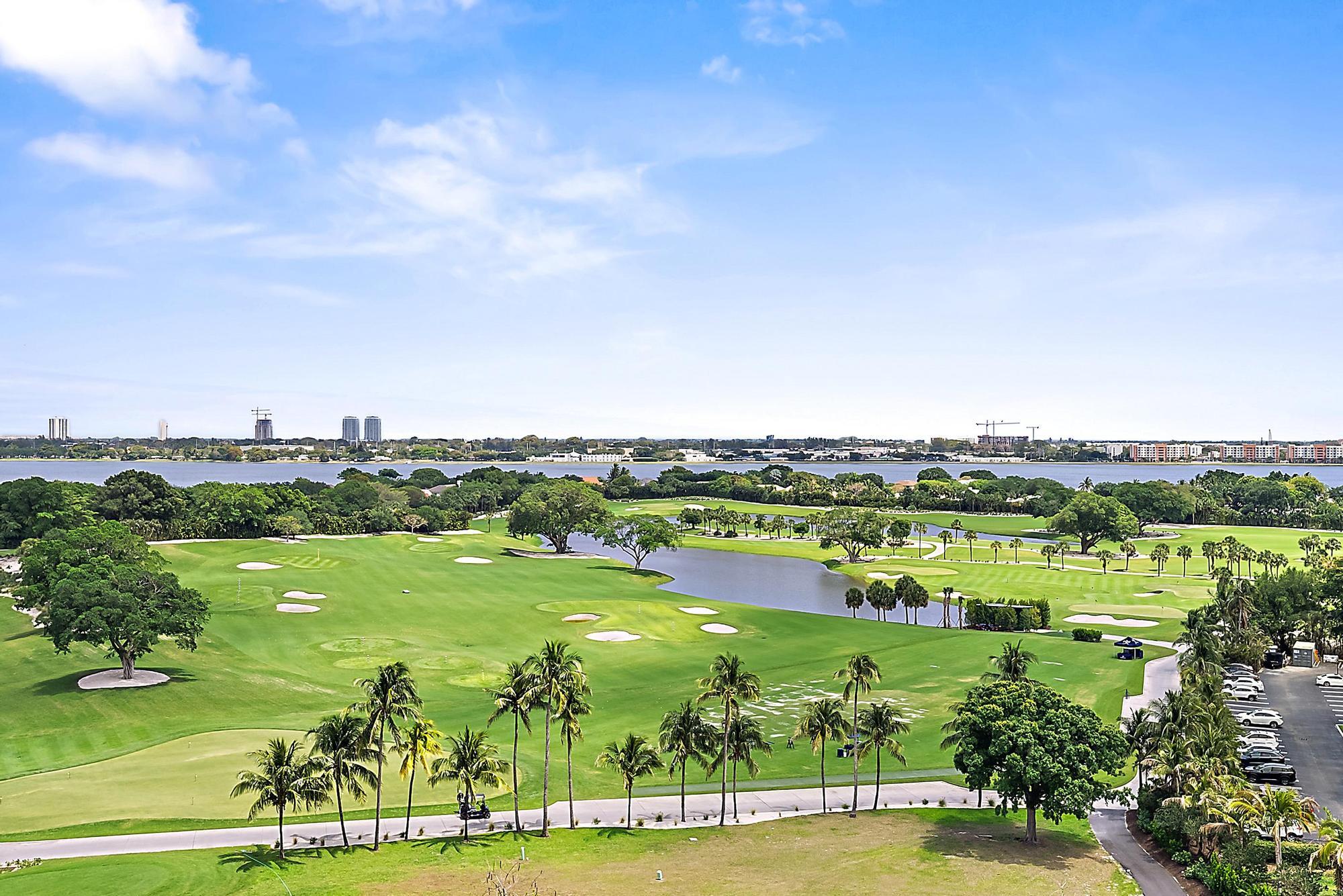 2400 Presidential Way, Unit 1204 West Palm Beach, FL 33401 - Photo 4 of 55 a view of lake with houses