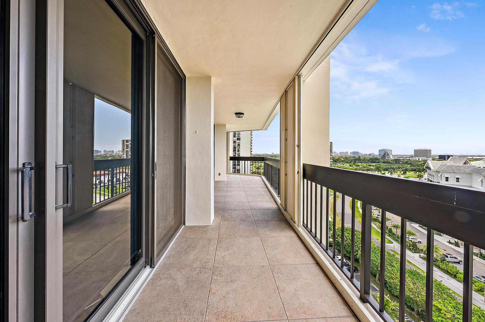 2400 Presidential Way, Unit 1204 West Palm Beach, FL 33401 - Photo 8 of 55 a view of a balcony with city view
