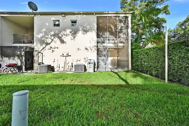 a view of building with yard