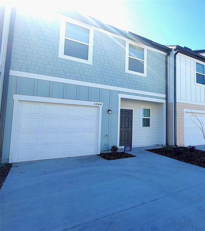 5944 Chestnut Grv Place St. Cloud, FL 34771 - Photo 1 of 1 a view of front door and yard