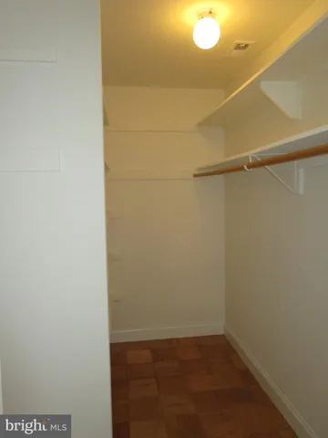 a view of a room with racks on the wall