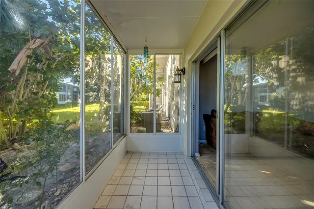 a view of a glass door and the porch