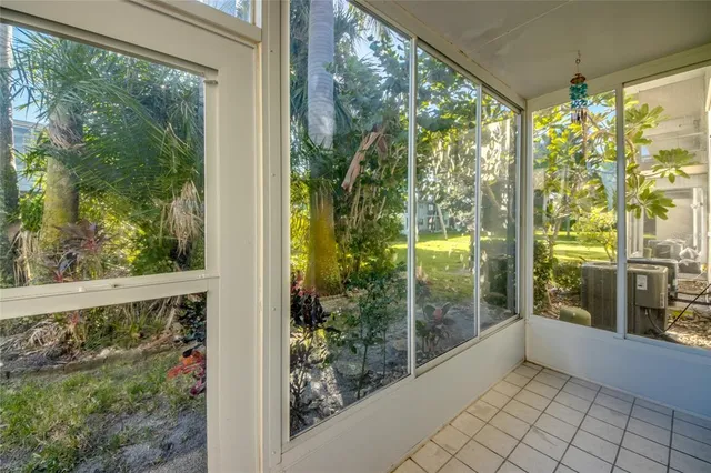 a view of a glass door and porch