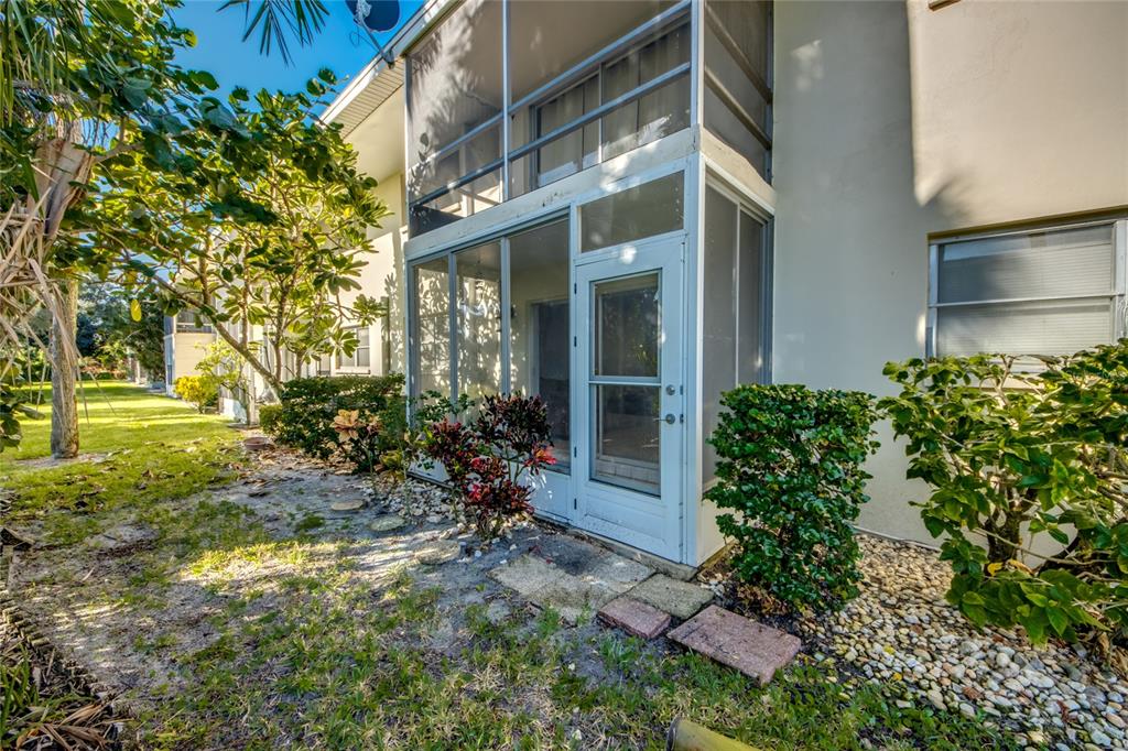 1003 Tropic Terrace North Fort Myers, FL 33903 - Photo 25 of 35 a view of a pathway with a house