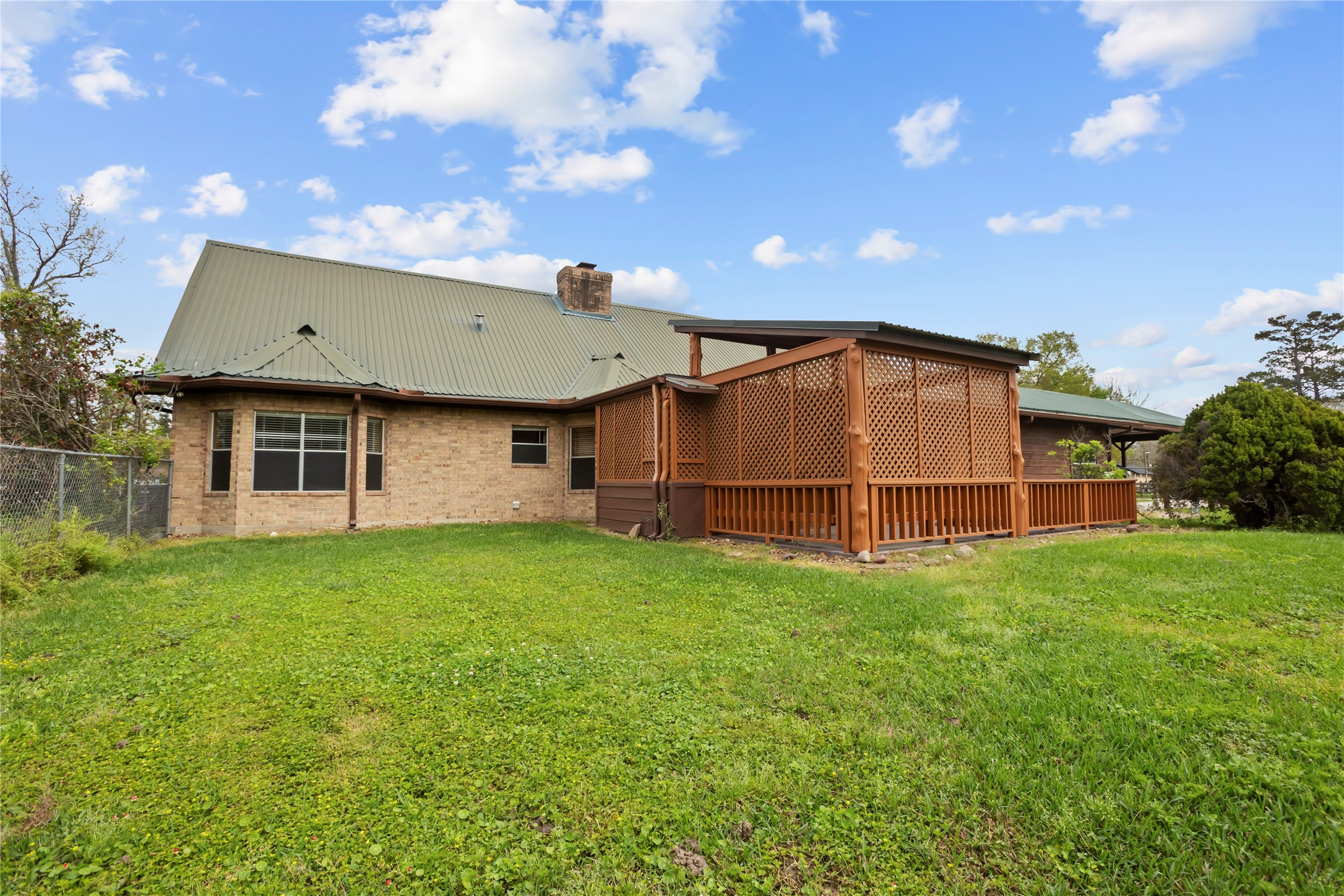22916 East Martin Drive Porter, TX 77365 - Photo 38 of 43 a view of a backyard of the house