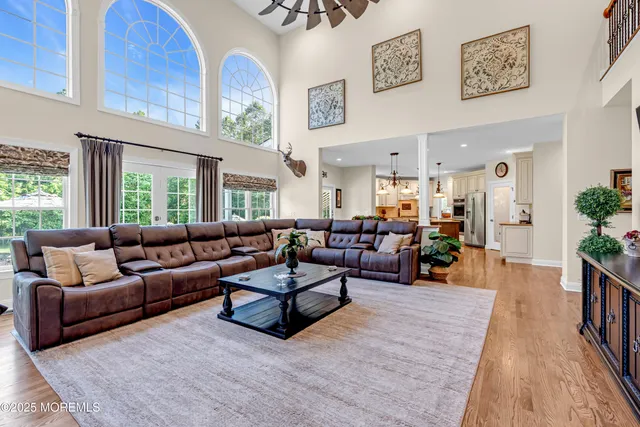 a work room with furniture and a window