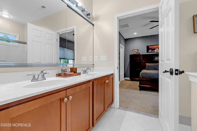 a view of a chair and tables in the patio