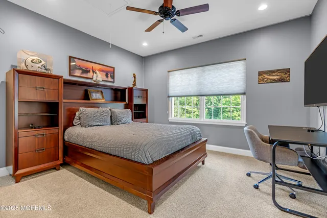 an aerial view of a house with a garden