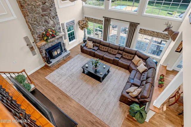 a view of a swimming pool in a backyard