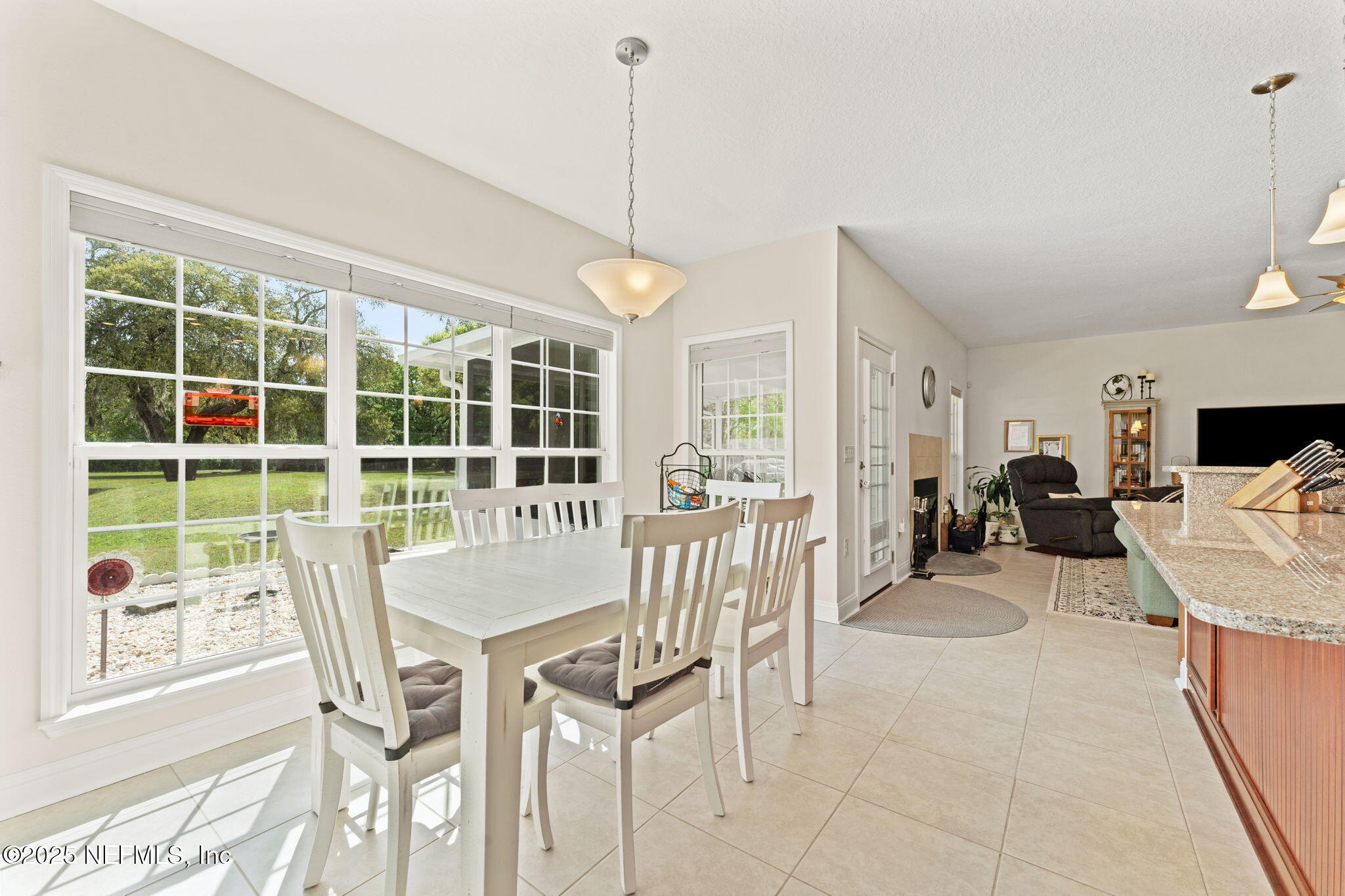 12869 Boney Road Jacksonville, FL 32226 - Photo 24 of 62 a view of a dining room with furniture window and outside view