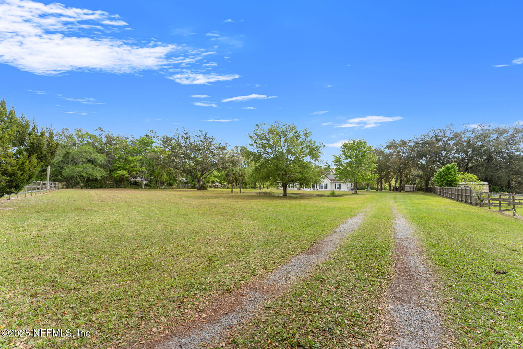 12869 Boney Road Jacksonville, FL 32226 - Photo 3 of 62 a view of a lake with a yard