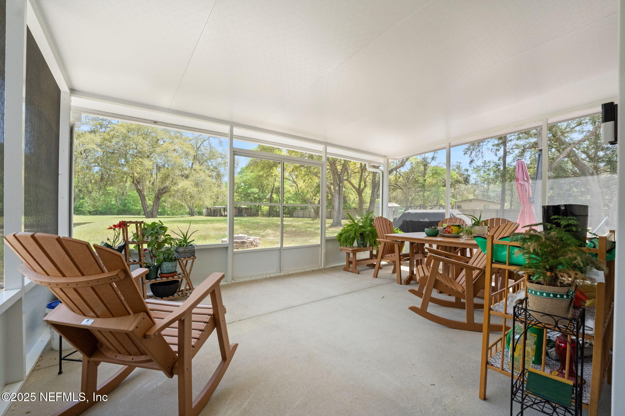 12869 Boney Road Jacksonville, FL 32226 - Photo 43 of 62 a room with furniture and a large window