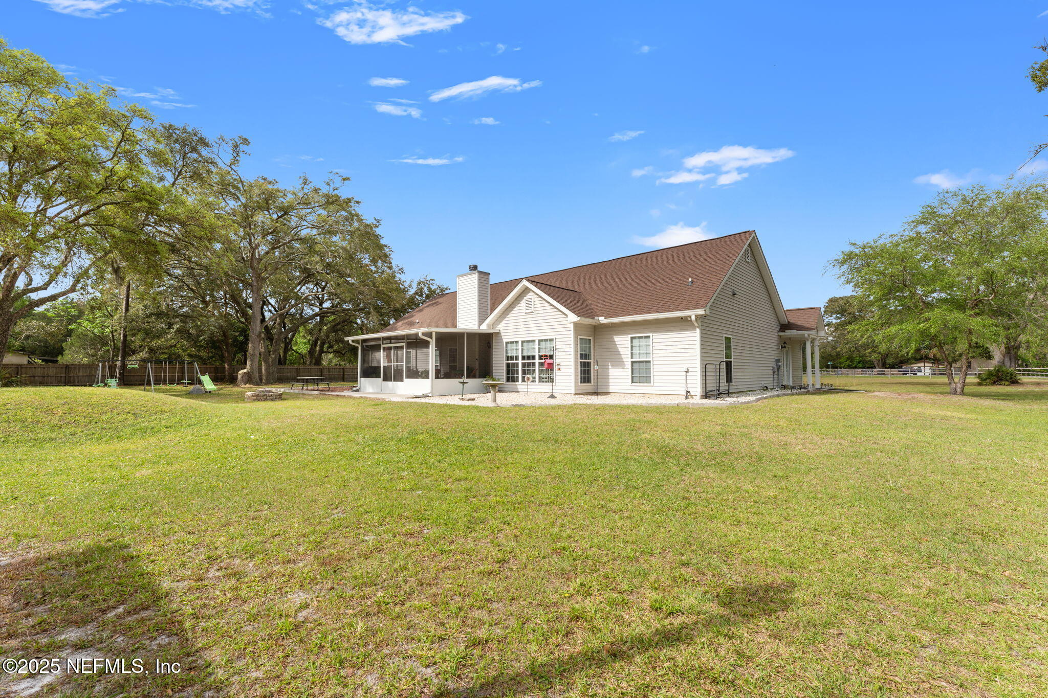 12869 Boney Road Jacksonville, FL 32226 - Photo 46 of 62 a front view of house with outdoor space and swimming pool