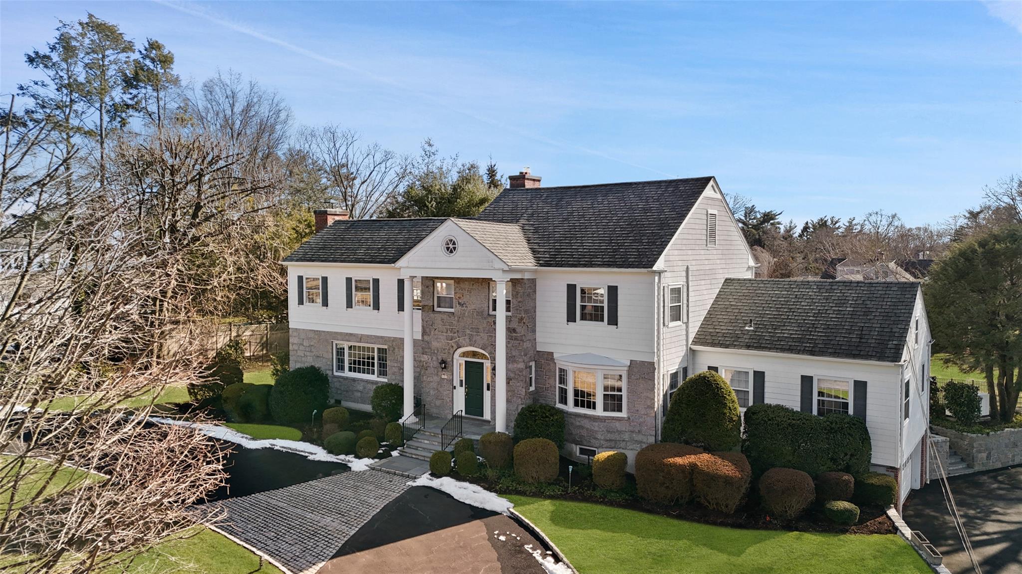 7 Justin Road Harrison, NY 10528 - Photo 1 of 1 a front view of a house with garden