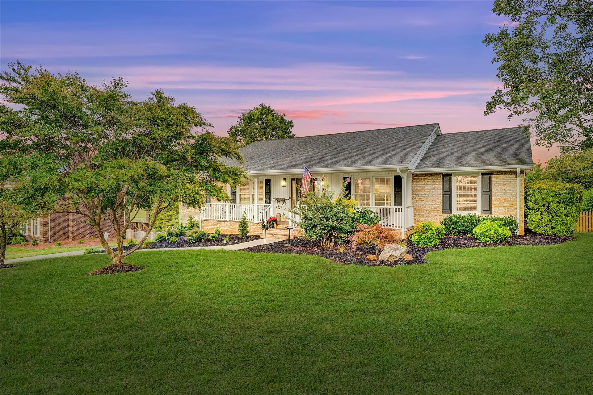 307 North Preston Road Vinton, VA 24179 - Photo 1 of 48 a front view of a house with a garden and trees