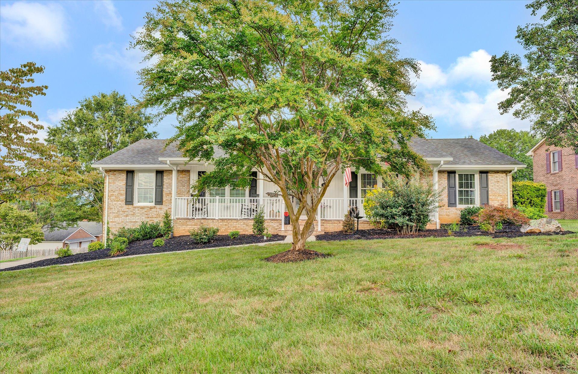 307 North Preston Road Vinton, VA 24179 - Photo 2 of 48 a view of a house with a big yard and large trees