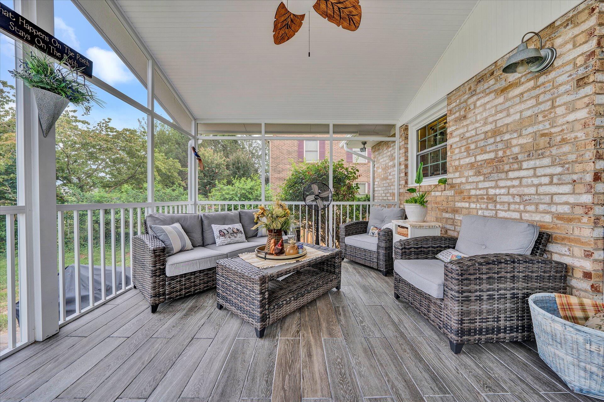307 North Preston Road Vinton, VA 24179 - Photo 24 of 48 a outdoor living space with patio furniture and a wooden floor