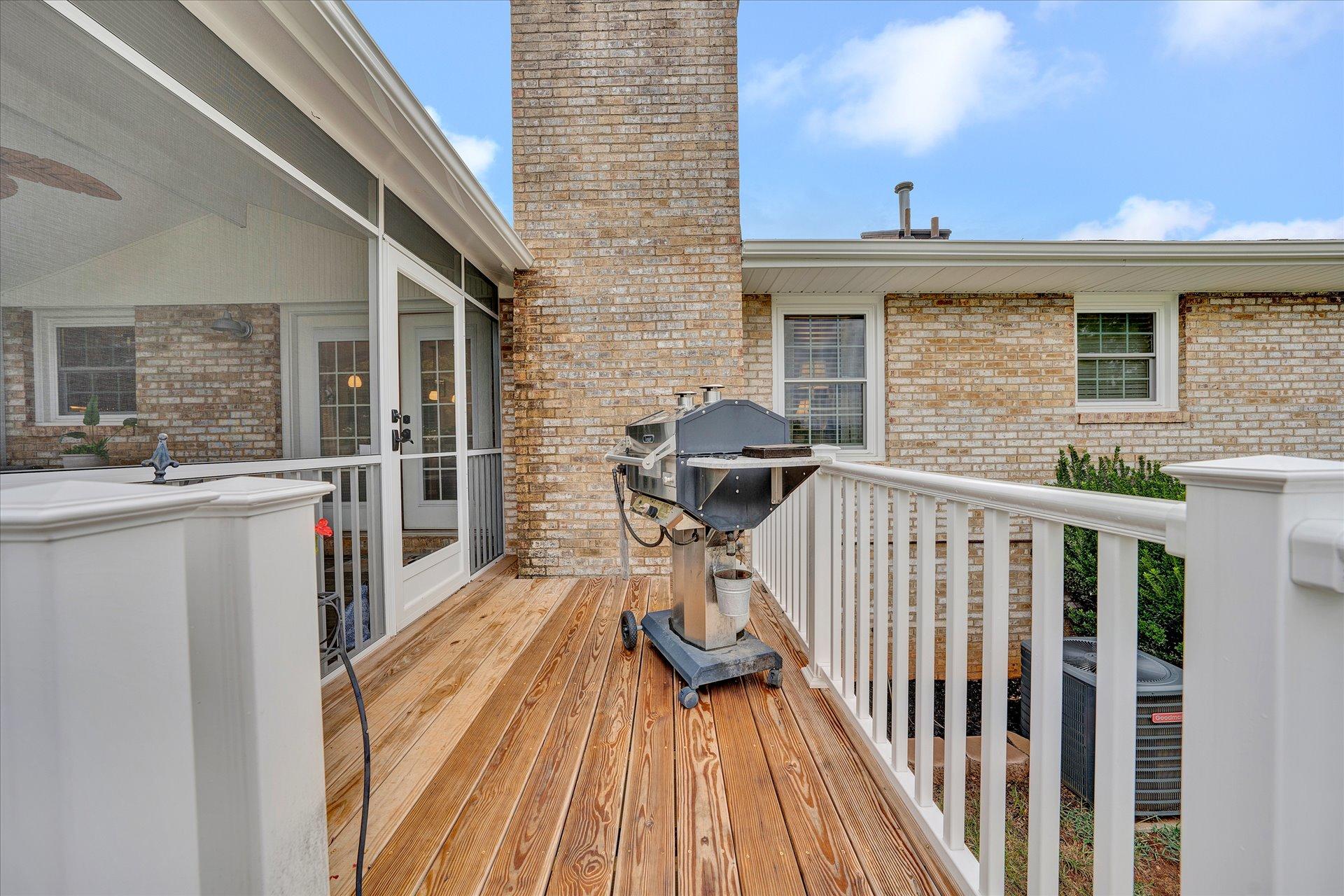 307 North Preston Road Vinton, VA 24179 - Photo 26 of 48 a view of a balcony with wooden floor and outdoor seating