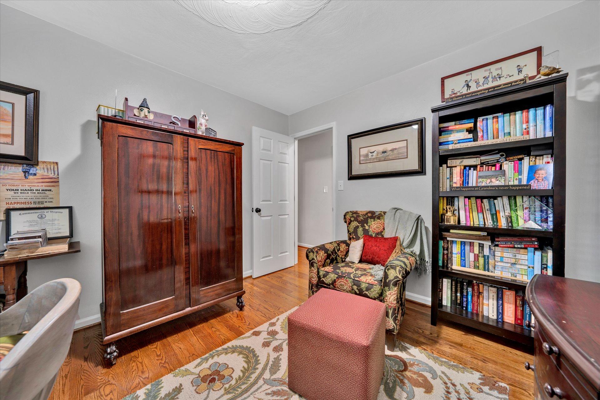 307 North Preston Road Vinton, VA 24179 - Photo 37 of 48 a living room with furniture cabinets and book shelf