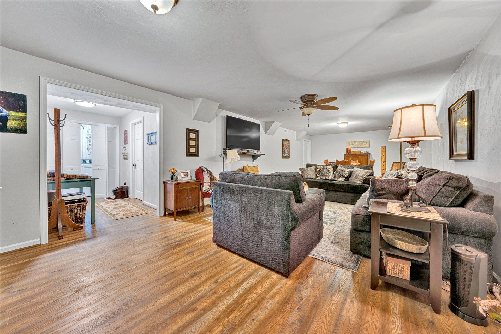 307 North Preston Road Vinton, VA 24179 - Photo 38 of 48 a living room with furniture and a wooden floor