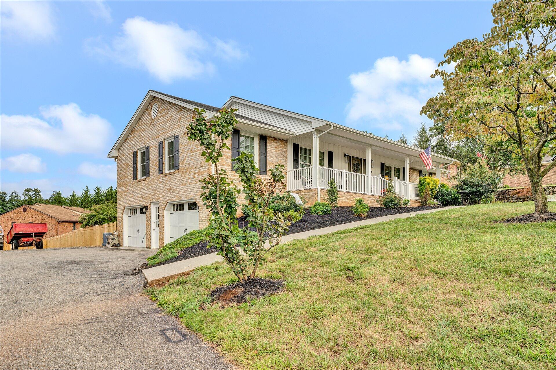 307 North Preston Road Vinton, VA 24179 - Photo 47 of 48 a front view of a house with a yard