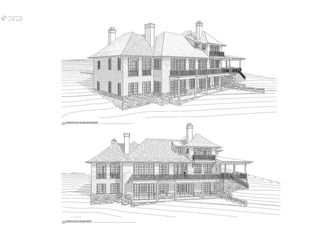 a view of a white house next to a yard