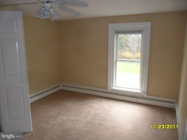 24610 Williston Road Denton, MD 21629 - Photo 11 of 17 an empty room with a window