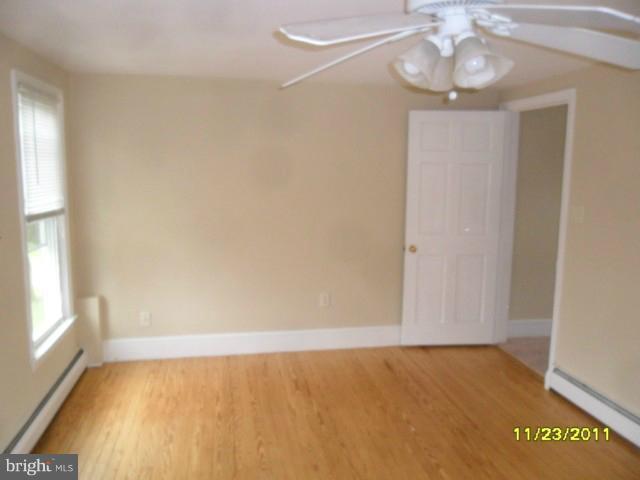 24610 Williston Road Denton, MD 21629 - Photo 12 of 17 a view of an empty room with a window
