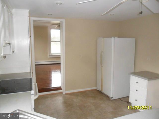 24610 Williston Road Denton, MD 21629 - Photo 13 of 17 an empty room with windows and closet