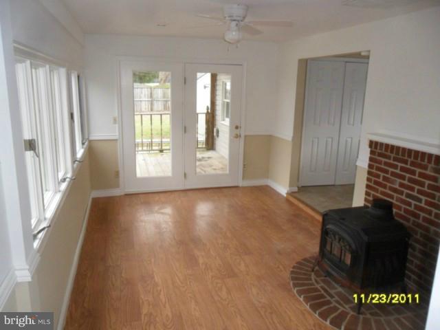 24610 Williston Road Denton, MD 21629 - Photo 15 of 17 a view of livingroom with hardwood floor and window