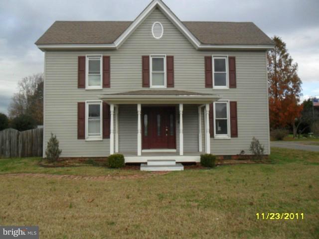 24610 Williston Road Denton, MD 21629 - Photo 17 of 17 a front view of a house with a yard