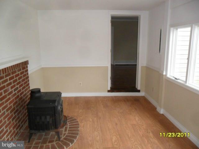 24610 Williston Road Denton, MD 21629 - Photo 9 of 17 a view of an empty room with a window