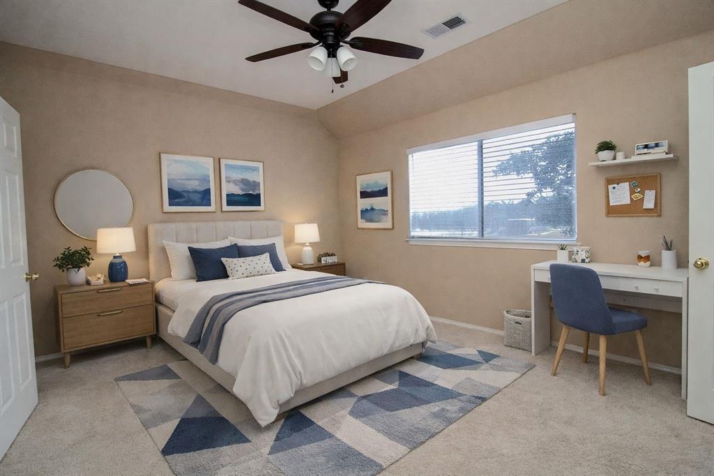 1100 Inland Lane McKinney, TX 75072 - Photo 27 of 36 a bedroom with a bed and a chandelier