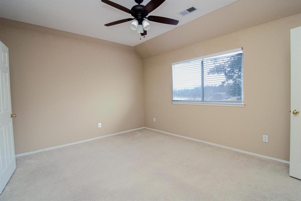 1100 Inland Lane McKinney, TX 75072 - Photo 35 of 36 an empty room with a window and a fan