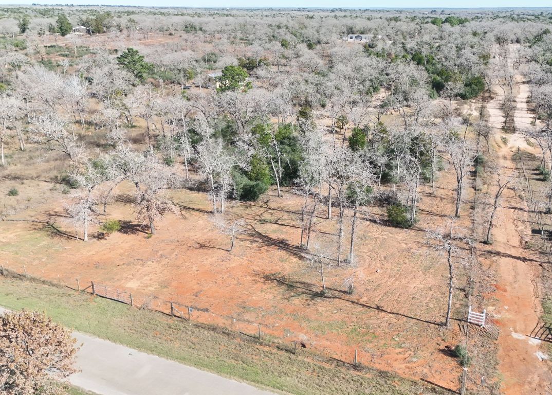 Tbd Lot 17 Tbd Road Smithville, TX 78957 - Photo 6 of 7 a view of backyard with wooden fence