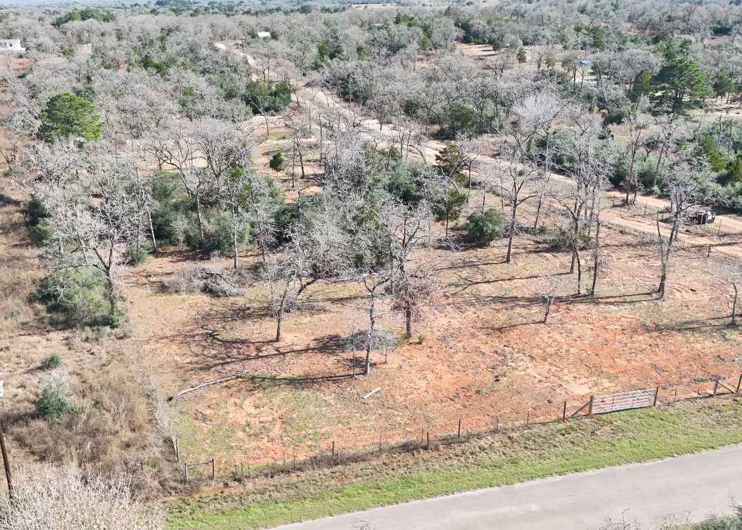 Tbd Lot 17 Tbd Road Smithville, TX 78957 - Photo 7 of 7 a view of a yard with wooden fence