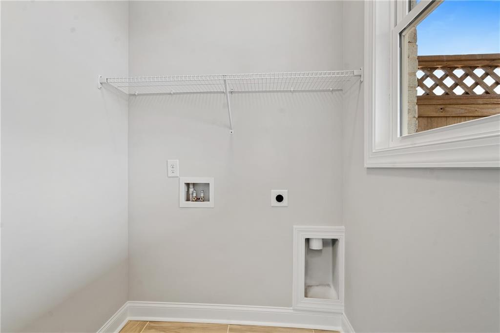 506 Whatton Road, Unit 3 Johns Creek, GA 30022 - Photo 13 of 36 a view of small space with racks on the wall