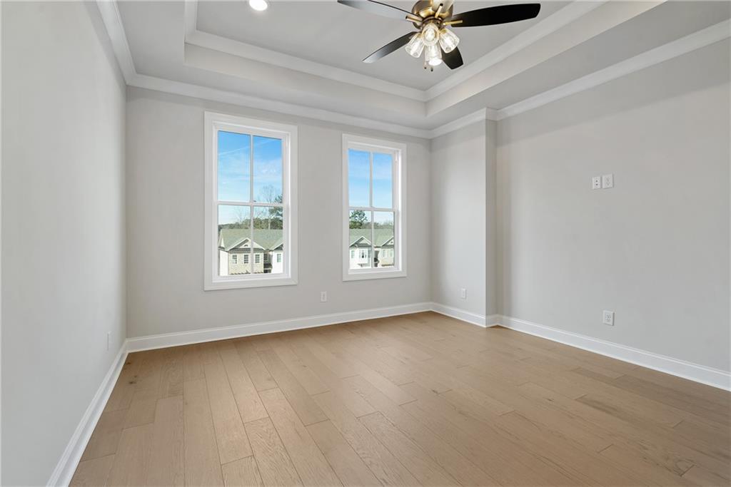 506 Whatton Road, Unit 3 Johns Creek, GA 30022 - Photo 16 of 36 a view of an empty room with a window